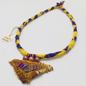 Handmade one of a kind up-cycled fabric necklace.